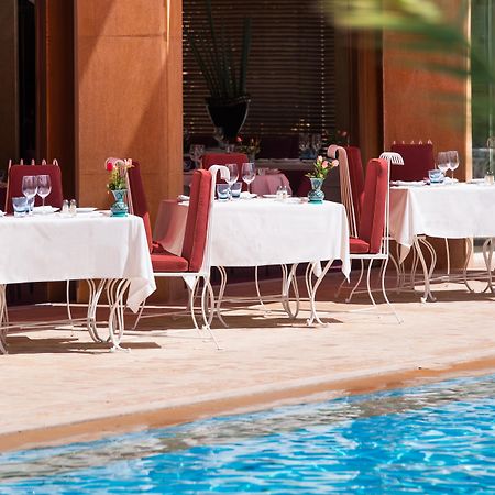 Es Saadi Marrakech Resort - Hotel Marrakesh Exteriör bild The pool at the Four Seasons Hotel